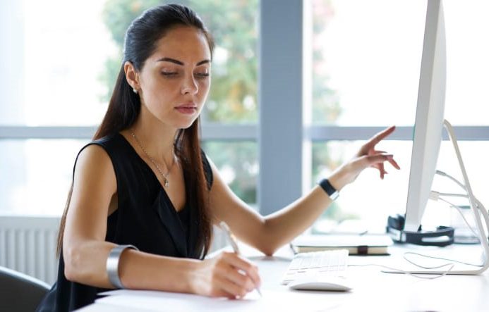 brand consulting agency woman working at a desk